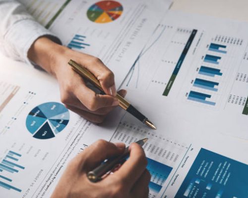 Close up Business people meeting to discuss the situation on the market. Business Financial Concept